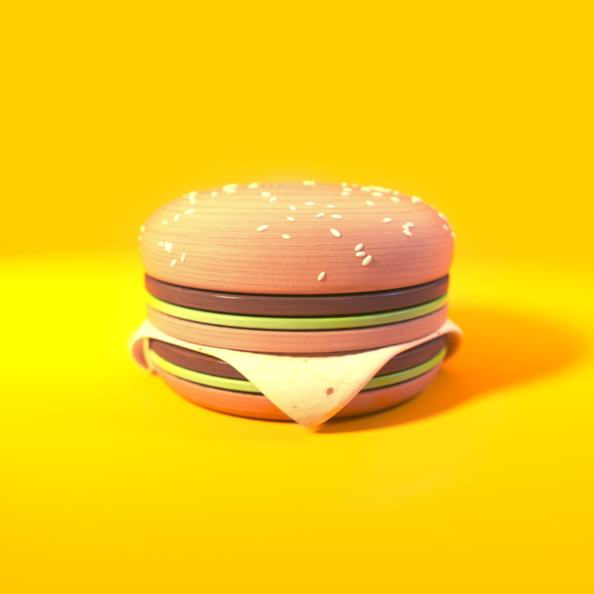 A Big Mac made out of wood that somehow still looks delicous.